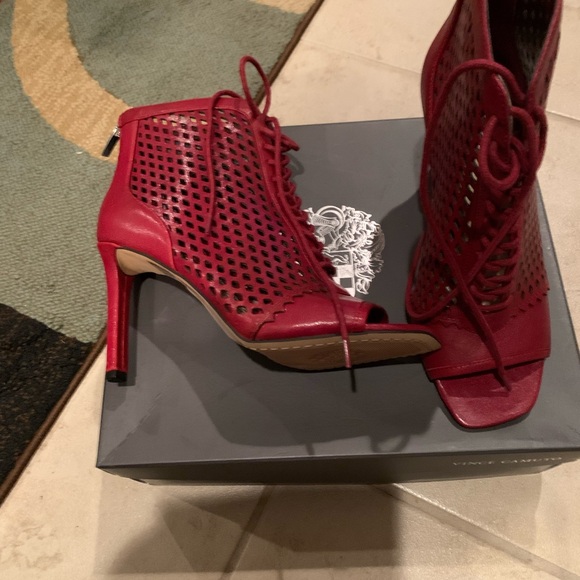 Red laced up open toe bootie. 2 years I’ve had. Maybe subject to inside shedding - Picture 2 of 5